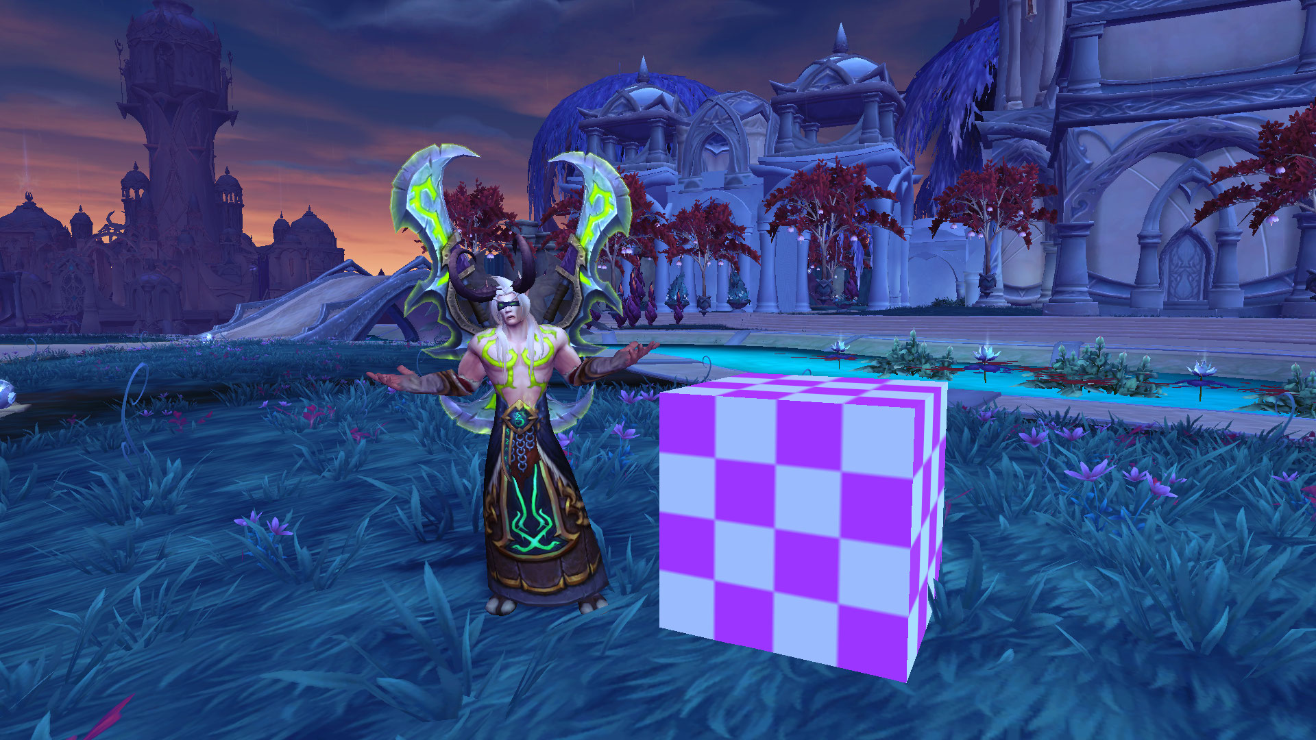 Un cube au beau milieu de l'herbe.